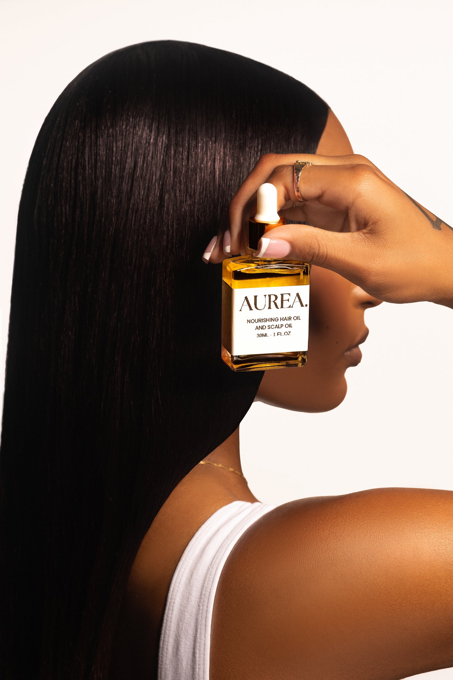 NOURISHING HAIR AND SCALP OIL
