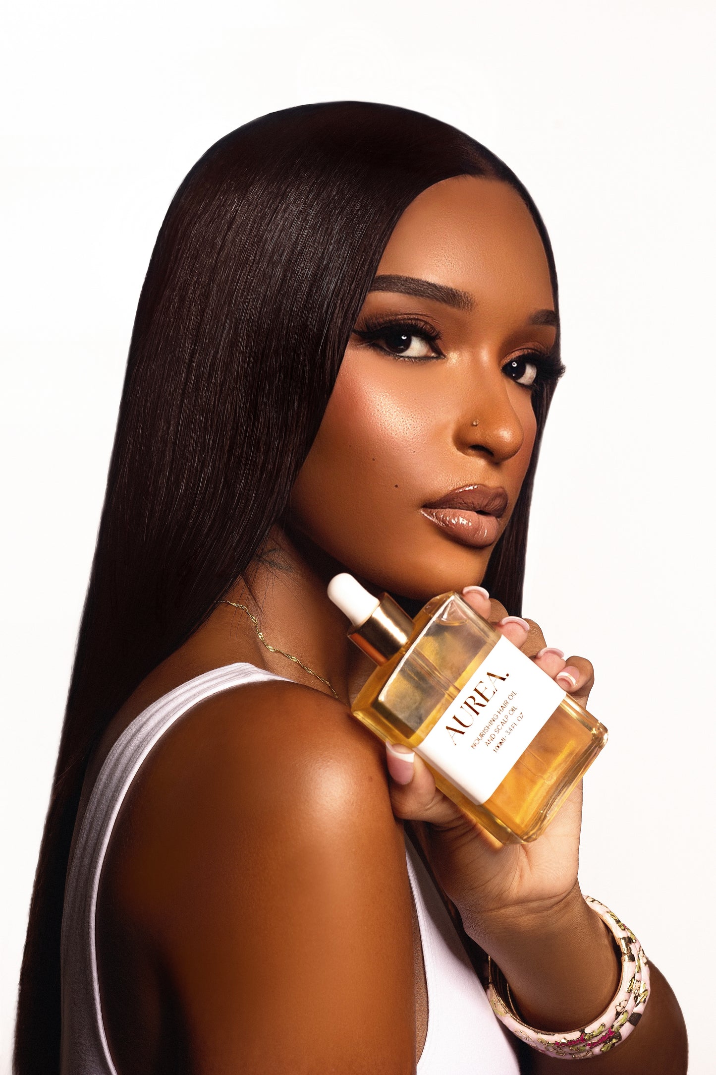NOURISHING HAIR AND SCALP OIL